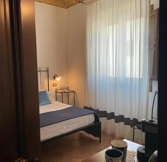 تختخواب و صبحانه Ai Dammusi Rooms