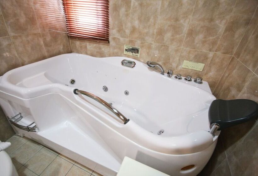 تختخواب و صبحانه Cao Ling Jiao Villa