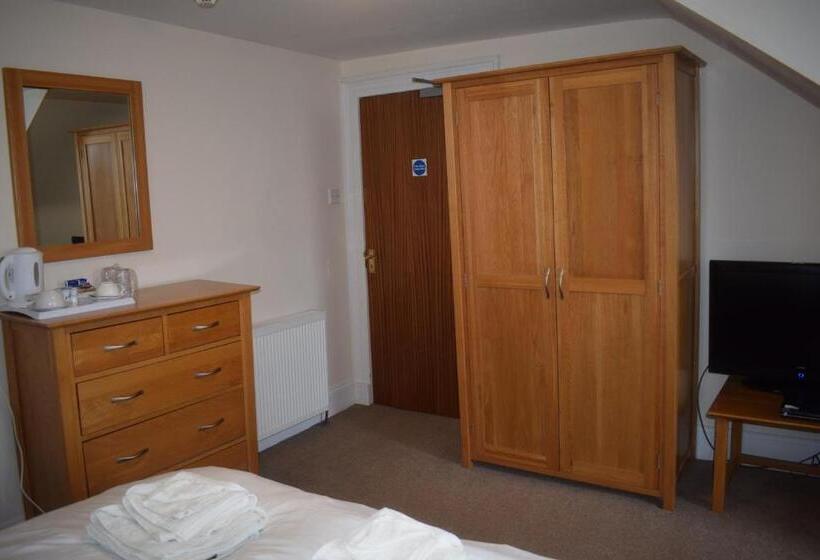 فندق صغير Cheers Cafe Bar & Tavern