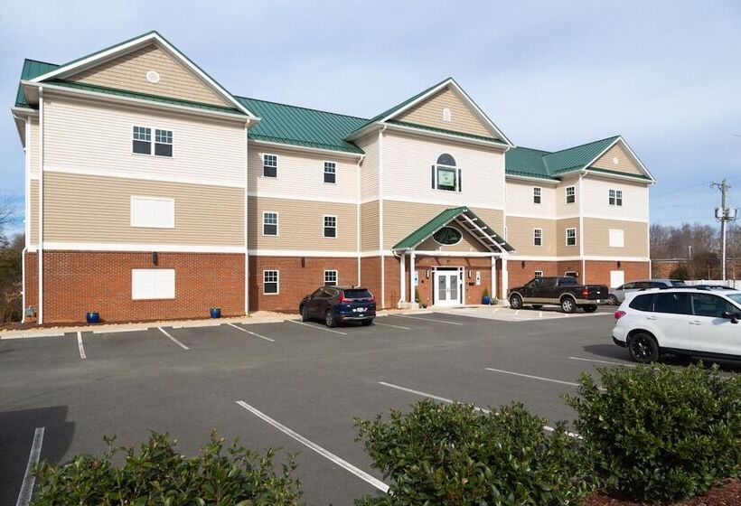 Отель The Acorn Suites
