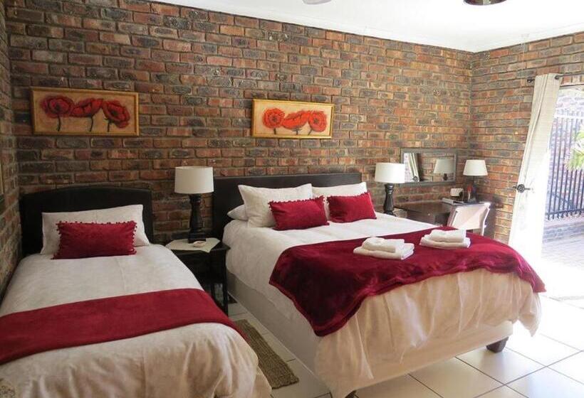 بنسيون Coral Tree Guest Rooms