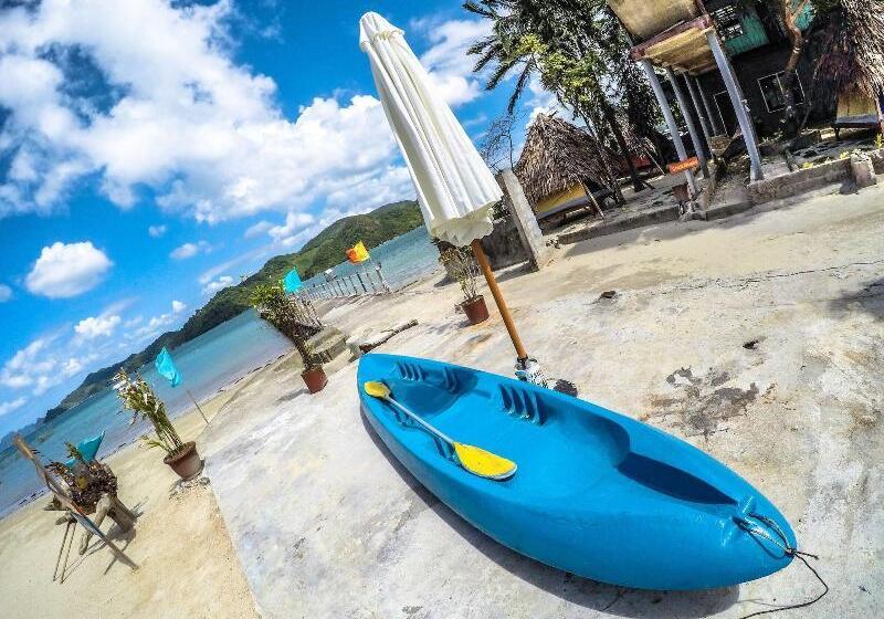 בית מלון כפרי Pangulatan Beach Resort