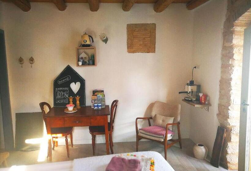 Номер Стандарт, La Corte 22