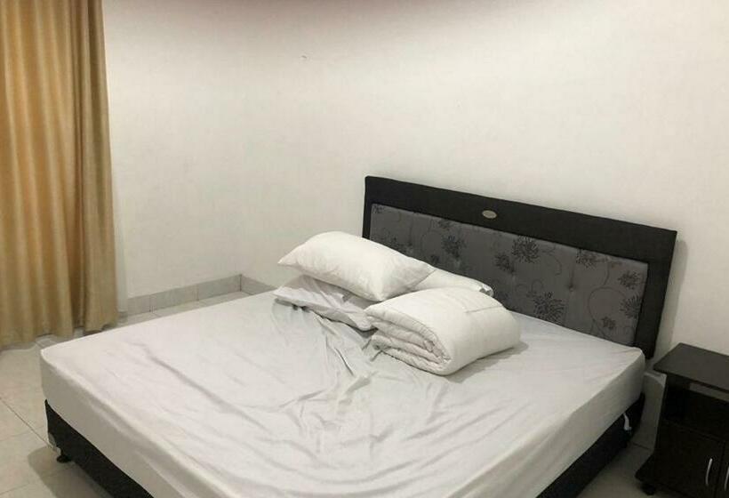 Номер Deluxe, Wisma Gardenia Palangkaraya Syariah Redpartner