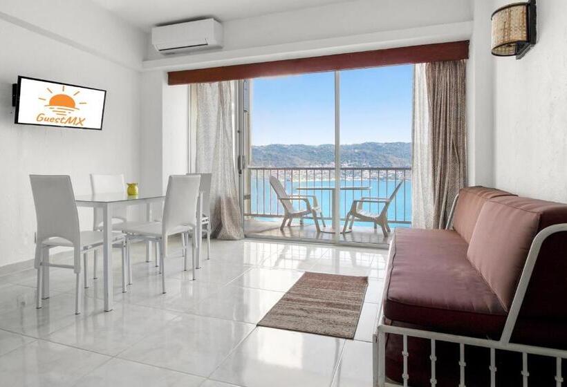 اتاق استاندارد چهار تخته با چشم‌انداز دریا, Suites Torres Gemelas Vip