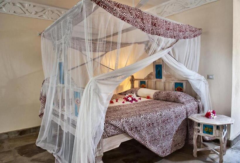 اتاق استاندارد چهارنفره با چشم‌انداز باغ, Jacaranda Beach Resort