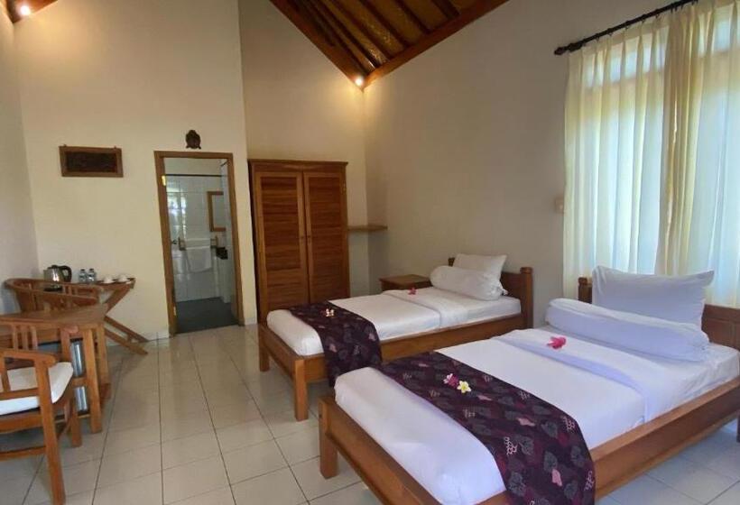 Бунгало Deluxe, New Starlight Hotel Lovina