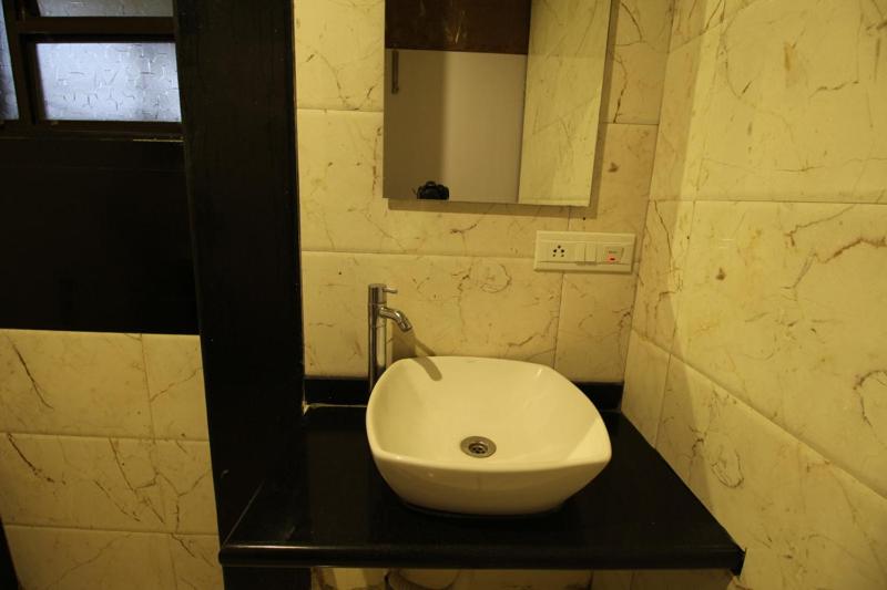 Номер Deluxe, Sham Suman, Kolhapur  Opposite To Mahalaxmi Temple
