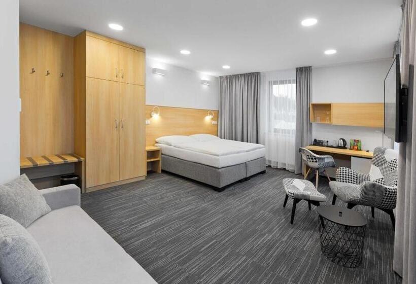 Deluxe Kamer, Ala