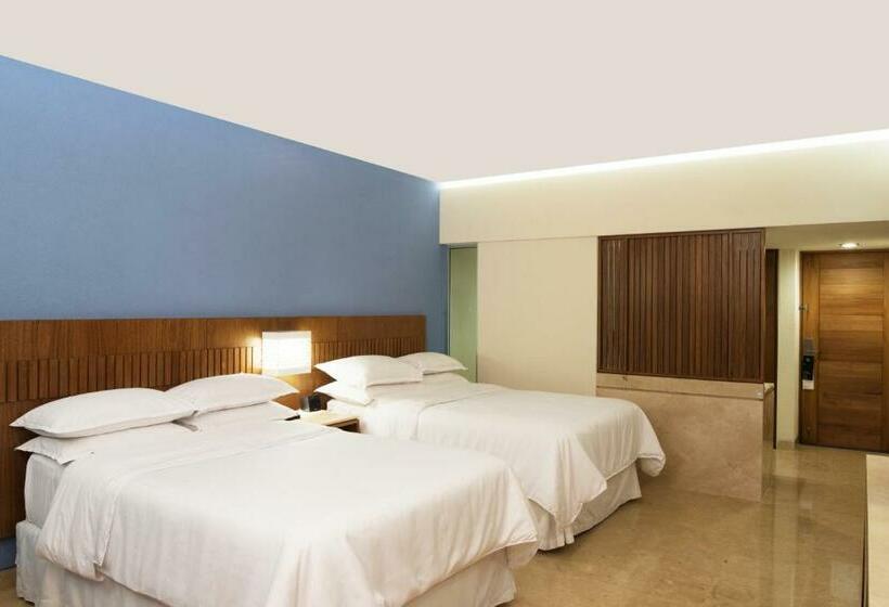 Quarto deluxe vista mar, Sheraton Buganvilias Resort & Convention Center