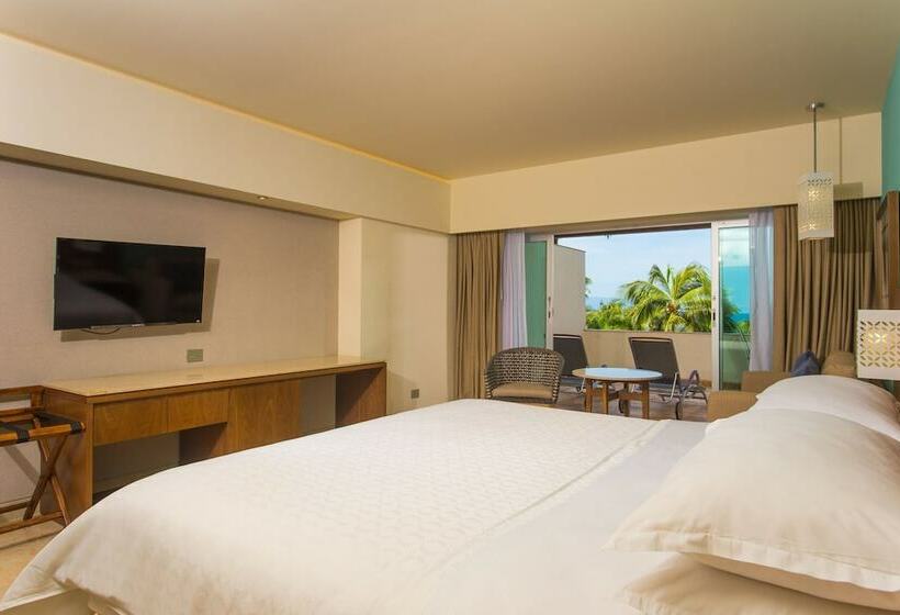 Quarto deluxe vista mar, Sheraton Buganvilias Resort & Convention Center