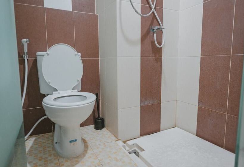 Номер Economy, Reddoorz Apartment @ Saladin Mansion Margonda