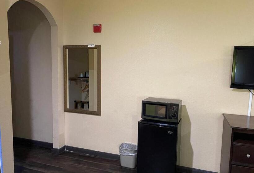 キングサイズベッドのスタンダードルーム, Red Lion Inn & Suites Iah Airport East