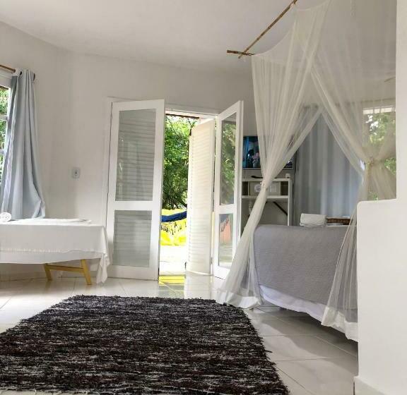 غرفة قياسية رباعية مزودة بشُرفة, Arraial Praia Hotel Pousada