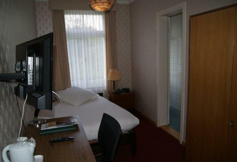 标准单人间, De La Paix