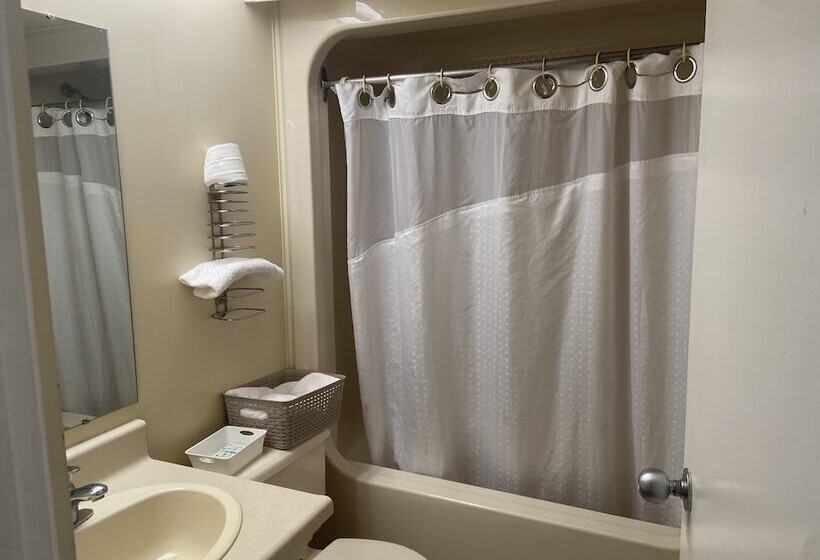クイーンサイズベッドのスタンダードルーム, Caravan Inn Motel