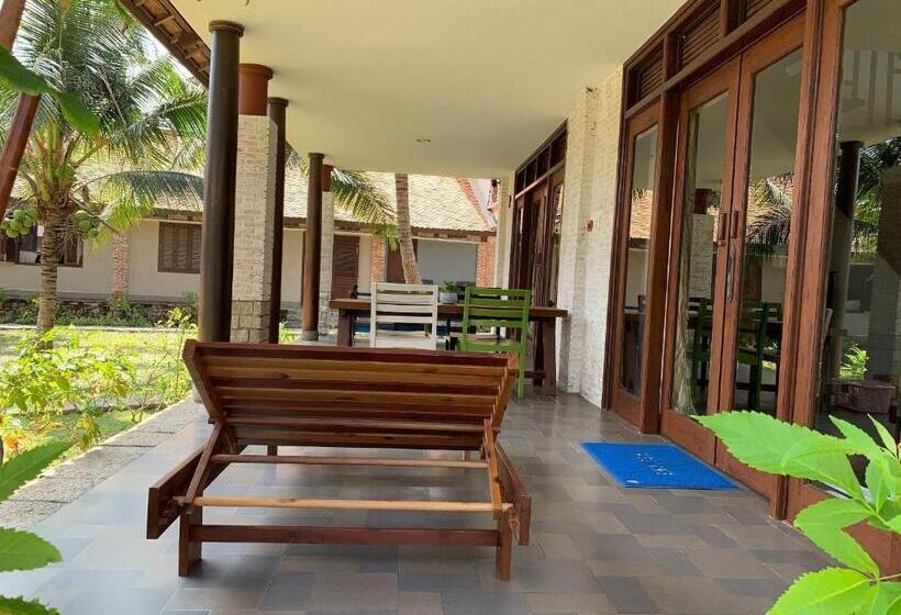 اتاق خانوادگی با چشم‌انداز باغ, Blue Shell Resort