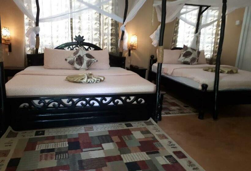 اتاق خانوادگی با چشم‌انداز باغ, Kijiji Beach Resort