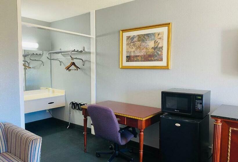 キングサイズベッドのスタンダードルーム, Traveler's Place Inn & Suites