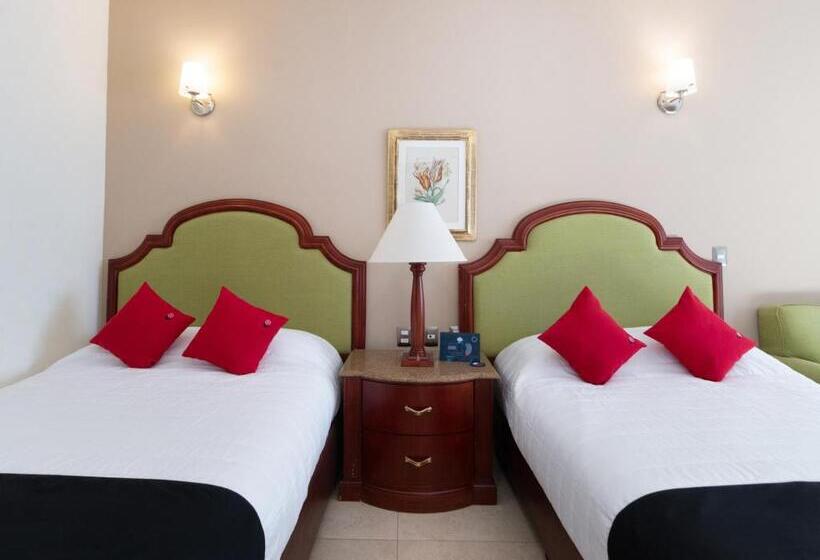 スイート, Capital O Hotel Vitale