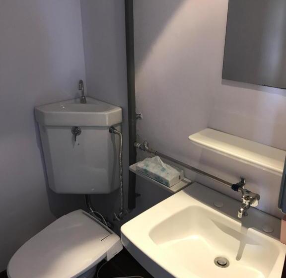 Кровать в Общей Комнате, Toyako Guest House Ponkotan