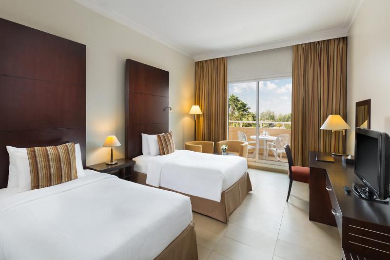 מיטת קינג בסוויטה, American Hotel Atlanta Downtown, Tapestry Collection Hilton