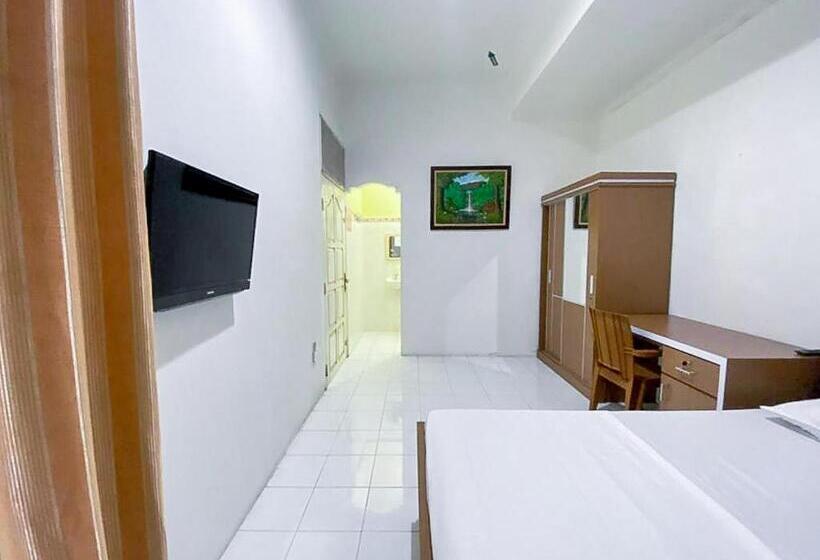 디럭스 룸, Damigalova Guest House Mitra Reddoorz