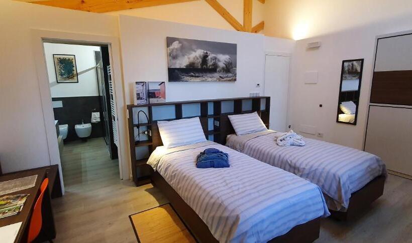 חדר דלוקס לארבעה, Relais Des Roches