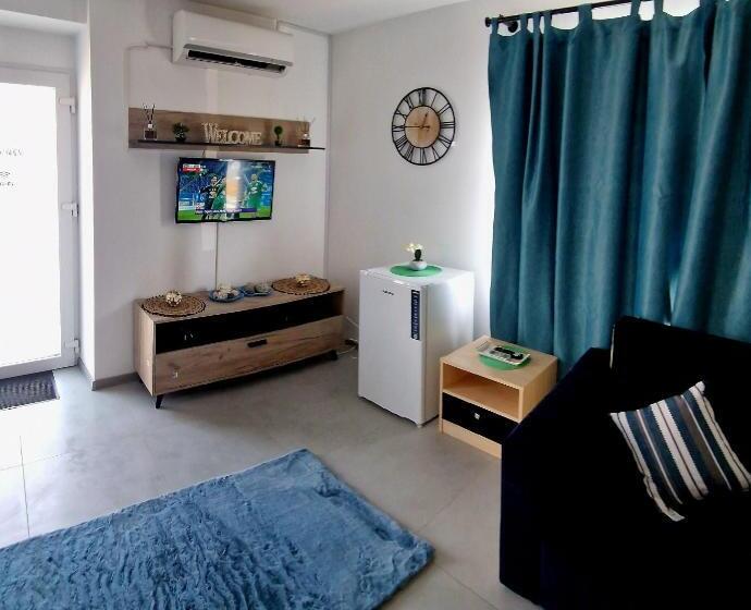 Habitació Quàdruple Deluxe, Mbi Smart Central