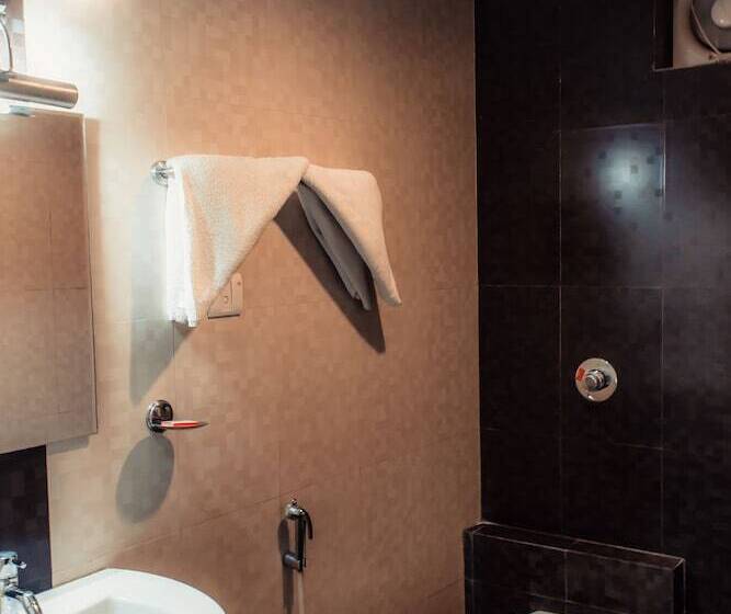 غرفة ديلوكس, The Signature Inn