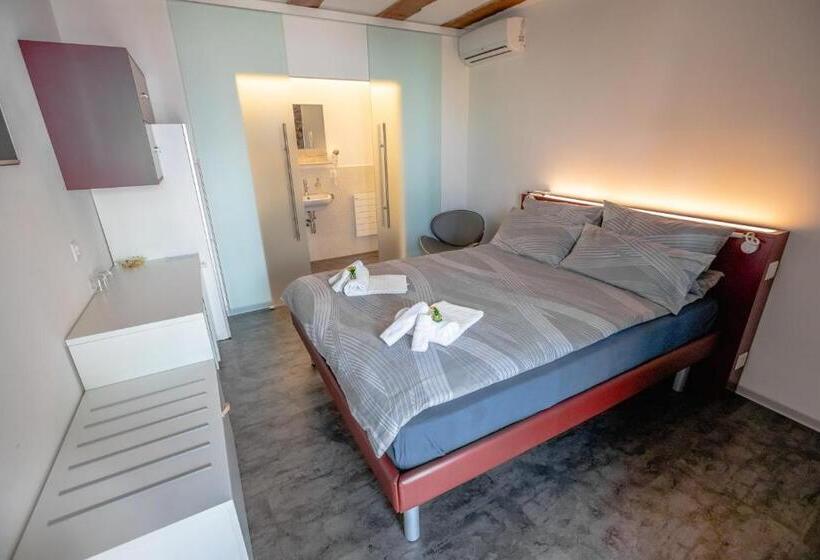 经济房, Albergo Porta Verzasca