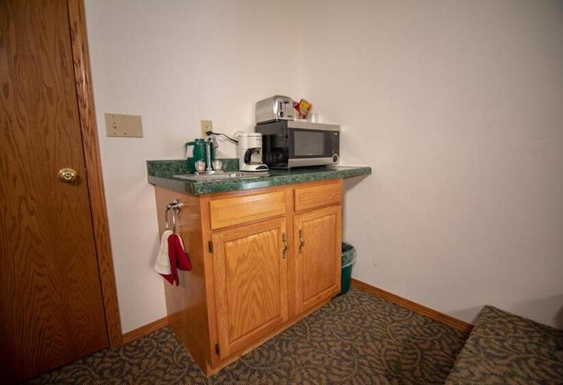 디럭스 스위트 킹 침대, Ridges Inn & Suites