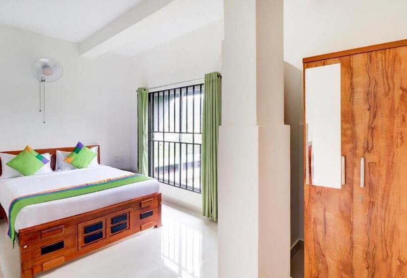 带特大床的标准间, Treebo New Redfern, Madikeri