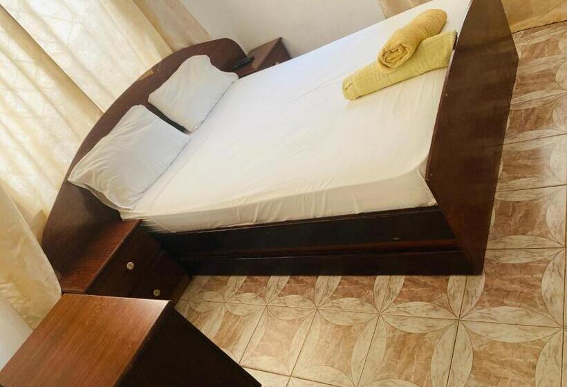带共用浴室的标准房间, One World Village Guesthouse