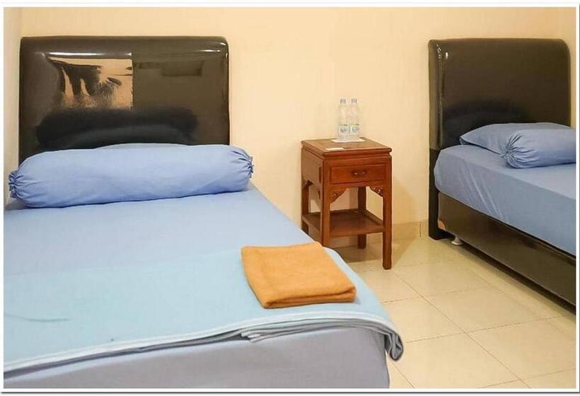 Номер Deluxe, Pondok Malabar Mitra Reddoorz