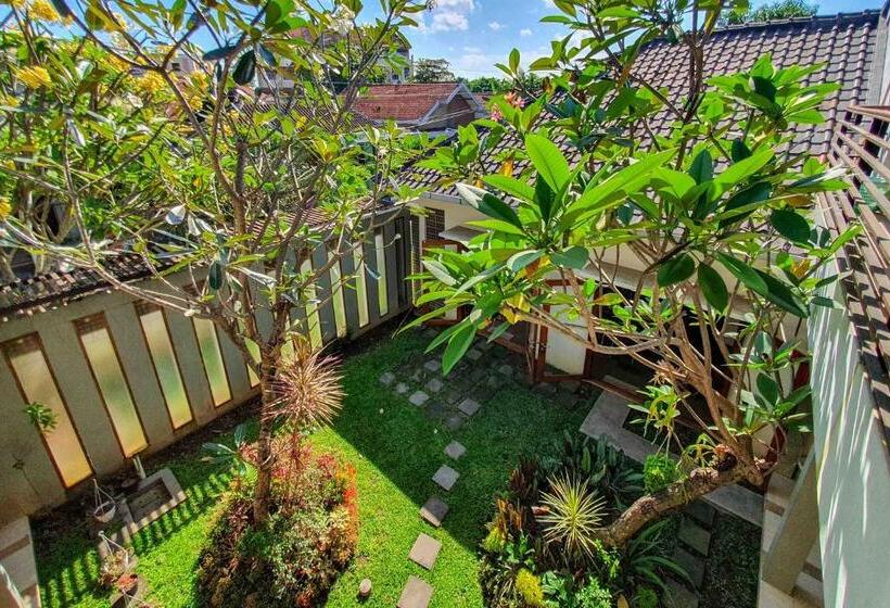 Номер Deluxe, Rumah Eyang Tardjo Syariah Mitra Reddoorz