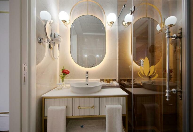 Quarto deluxe, Elysium Green Suites