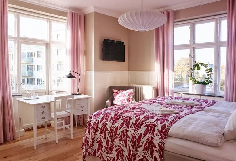 Quarto deluxe, Millasvilla