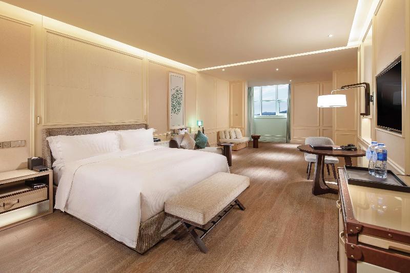 Habitación Premium Vista al Mar., Hilton Dalian Golden Pebble Beach Resort