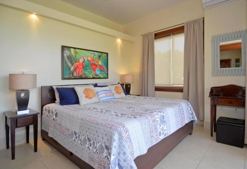 דירת חדר בקומת קרקע, The Villas At Cocoplum