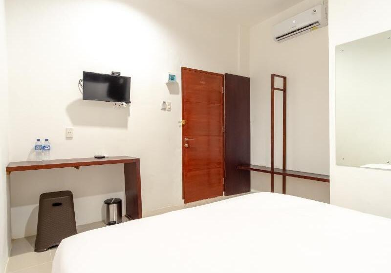 Номер Deluxe, Urbanview Os Residence Medan By Reddoorz