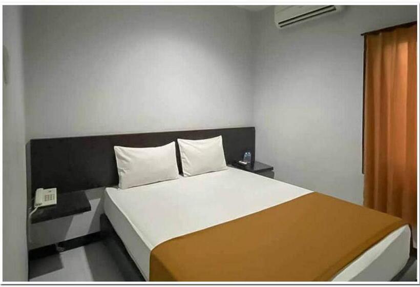 Номер Economy, Losmen Family Syariah Bypass Juanda Mitra Reddoorz