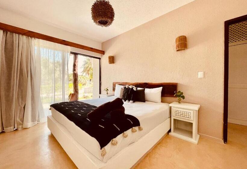 سوییت با چشم‌انداز باغ, Pavoreal Beach Resort Tulum