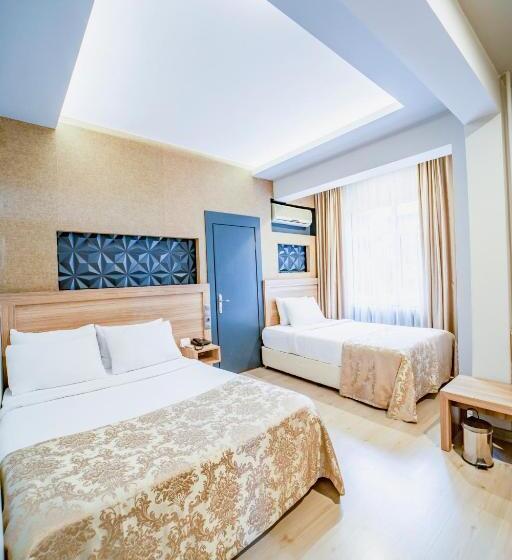Habitación Triple Estándar Vista Jardín, Aksular