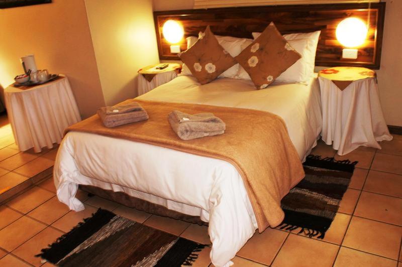Номер Стандарт, Flintstones Guest House Durban