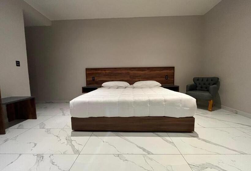 キングサイズベッドのスタンダードルーム, Quieto Hotel Suites