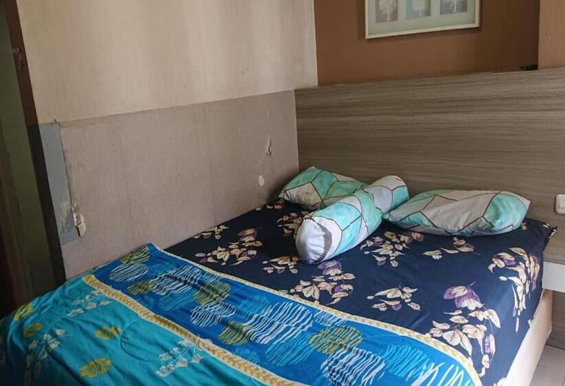 Номер Deluxe, Oyo Life 93139 Apartemen Grand Sentraland By Evi