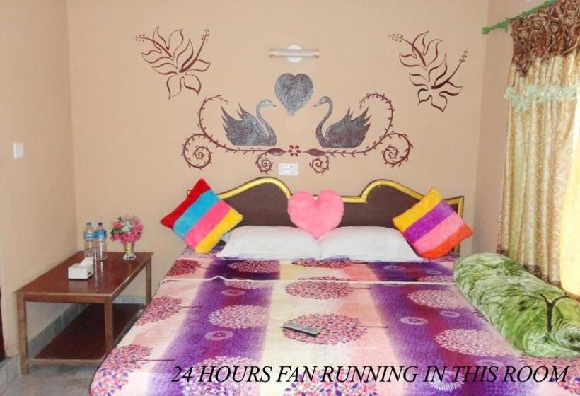 Deluxe Suite King Bed, Nikunj Safari Guest House Sauraha  A Place Where You Can Book Jungle Wildlife Safari