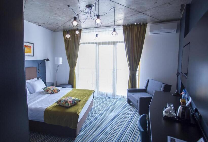 اتاق سه نفره دلوکس با چشم‌انداز دریا, Aparthotel Tangerine