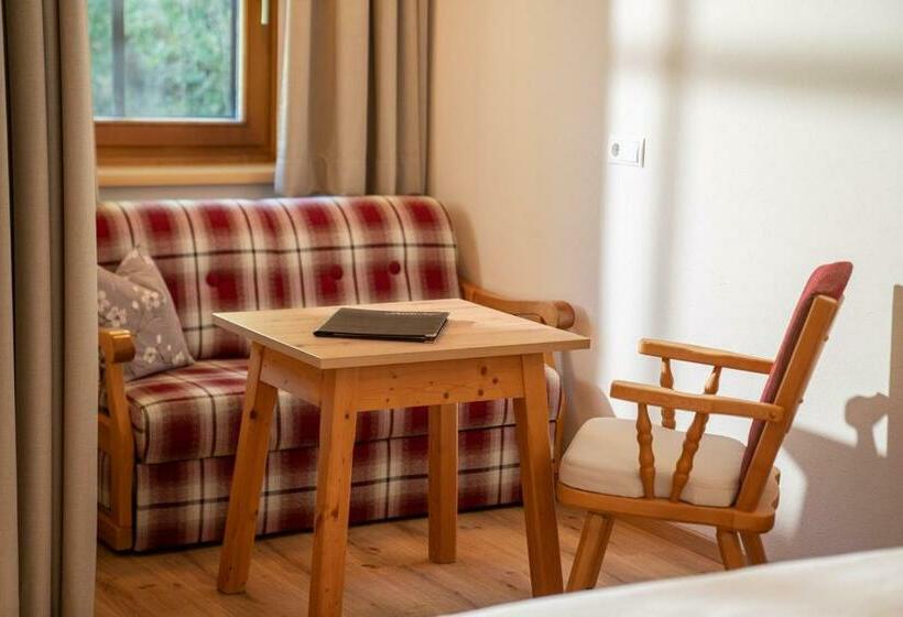 غرفة عائلية, Am Sonnenhügel